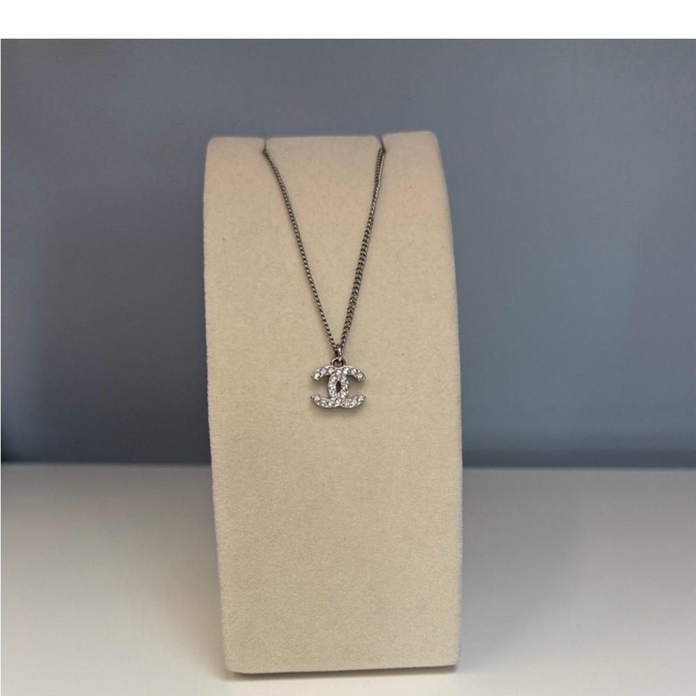 Elegant CHANEL Silver Necklace with Crystal Accents